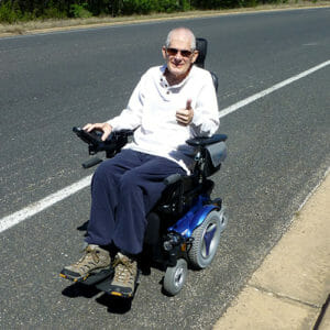 Photo of Tom, a retired Air Force pilot with ALS and a SmartVest user.