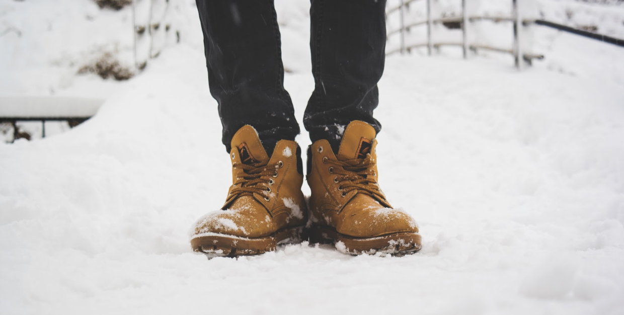 Boots being worn in the snow
