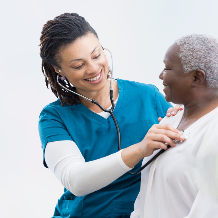 doctor with patient checking lungs